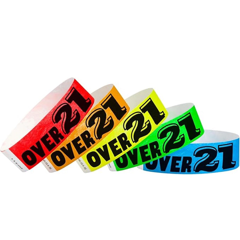 Five colorful event wristbands with 'OVER 21' text