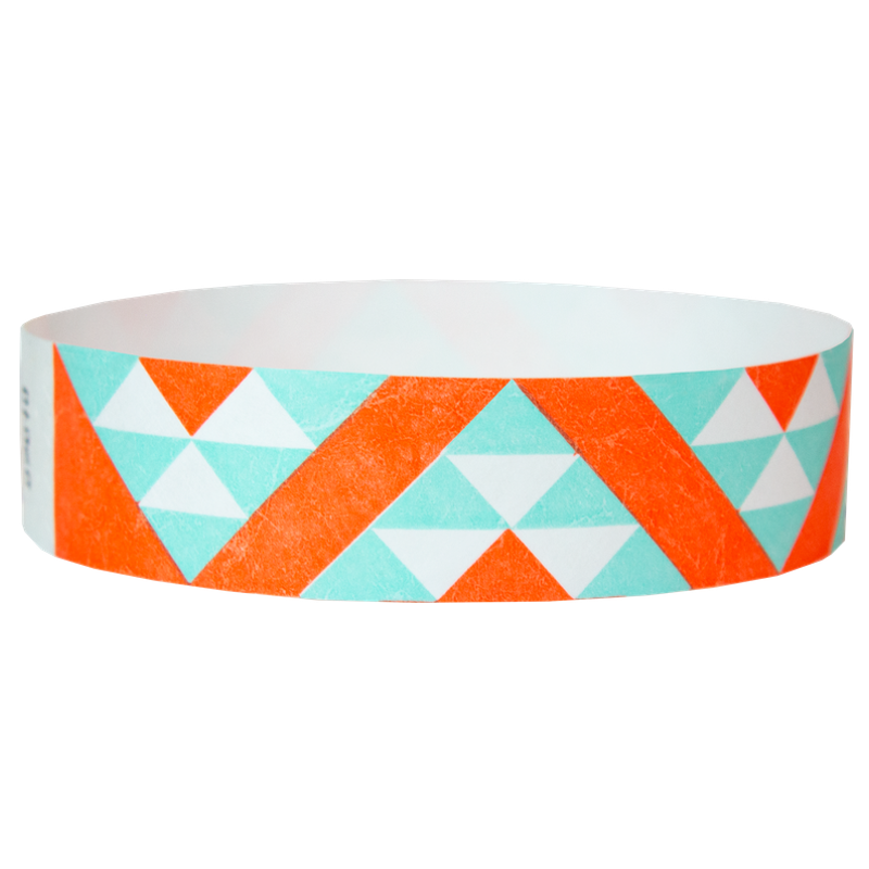 aztec pattern in neon orange and aqua on a white tyvek wristband - round version shown