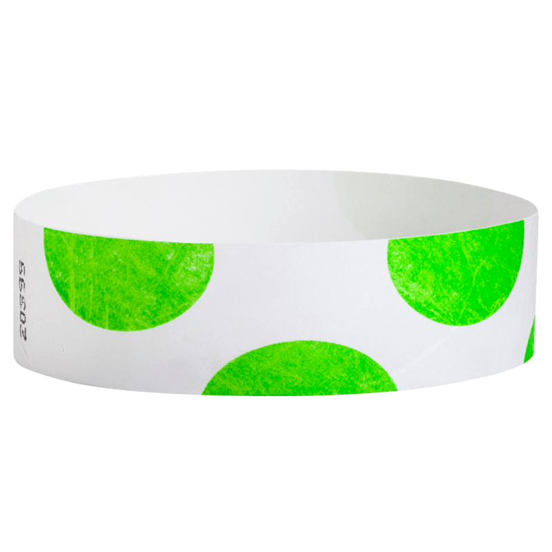 White wristband with green circular patterns