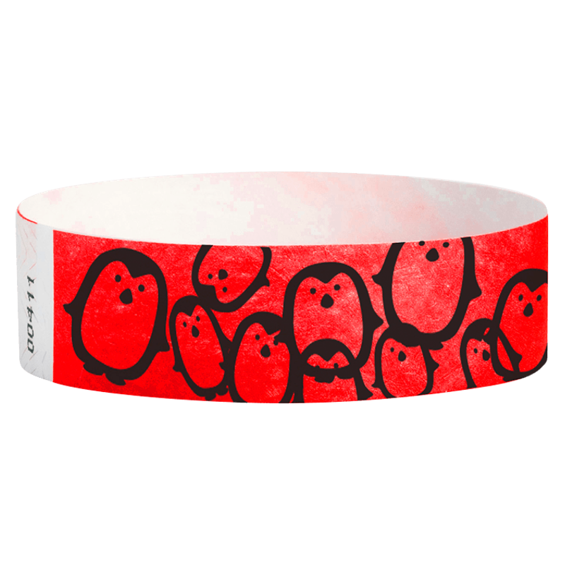 Red wristband with black penguin design