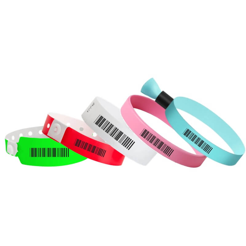 barcode wristbands shown on neon green wide face vinyl, neon red regular plastic, solid white tyvek, light pink silicone and aqua cloth