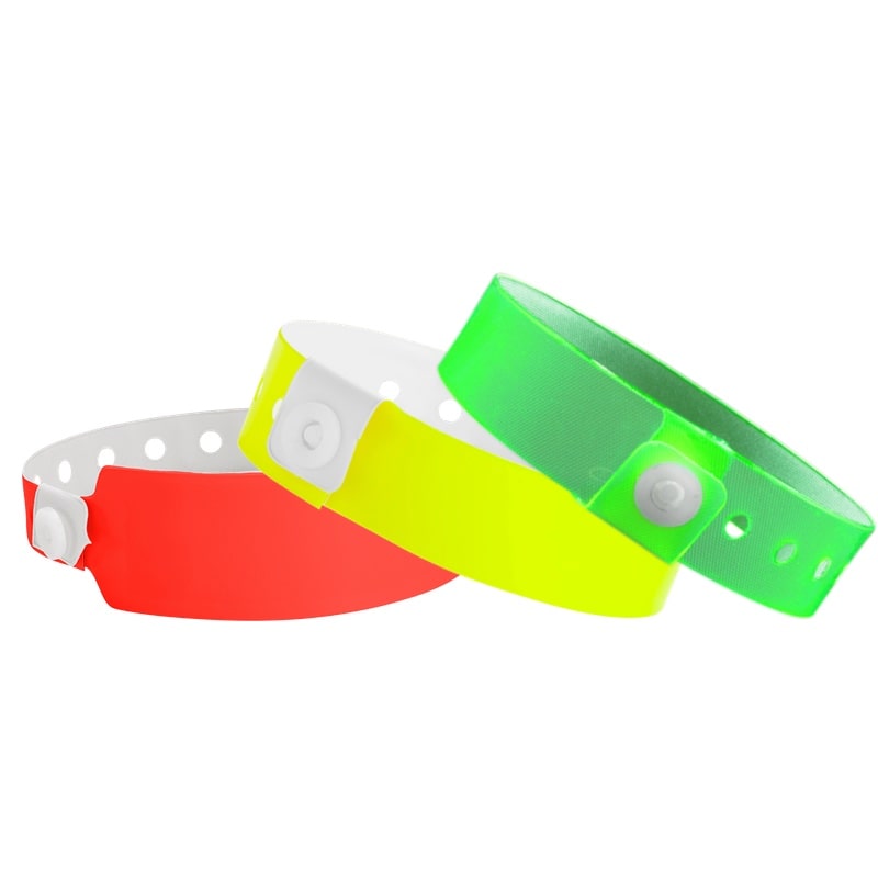vinyl stock wristbands showing wide face vinyl neon red, regular vinyl neon yellow and edge glow vinyl neon green