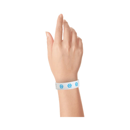 hand wearing white tyvek wristband with neon blue sun pattern repeated