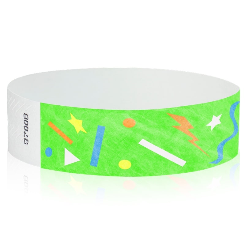neon green wristband with a confetti pattern in neon orange, white, neon yellow and neon blue - round version shown