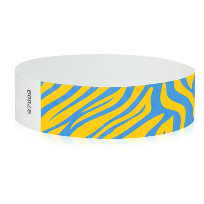 neon orange tyvek wristband with neon blue zebra pattern - round version shown