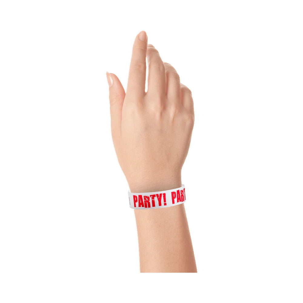 wrist wearing a white tyvek wristbands with neon red lettering - Party!