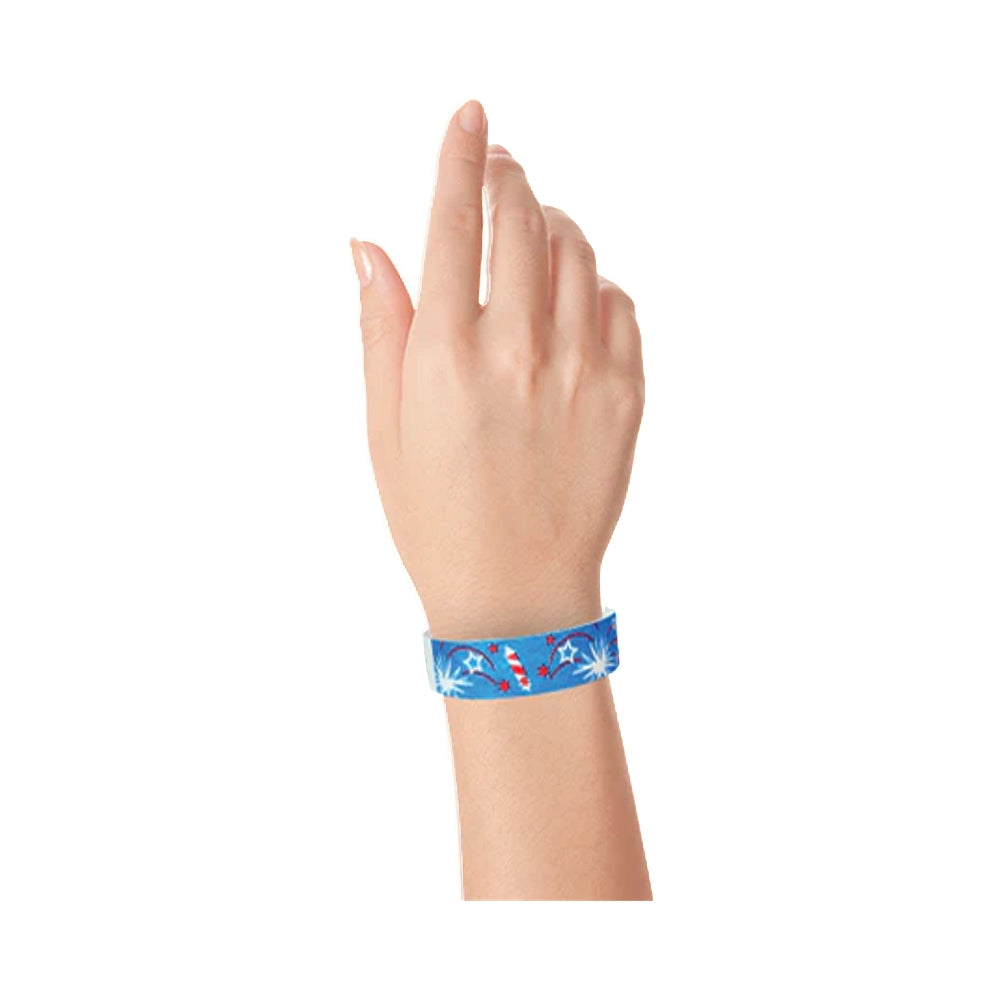Wrist wearing blue wristband with fireworks 