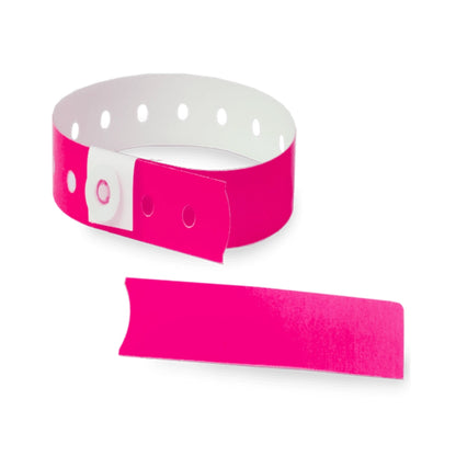 Plastic slim wristband in neon pink - shown in round with stub 