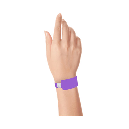 Wrist wearing plastic wide face wristband in purple