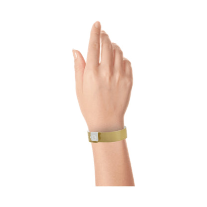vinyl regular wristband in gold - shown on wrist 