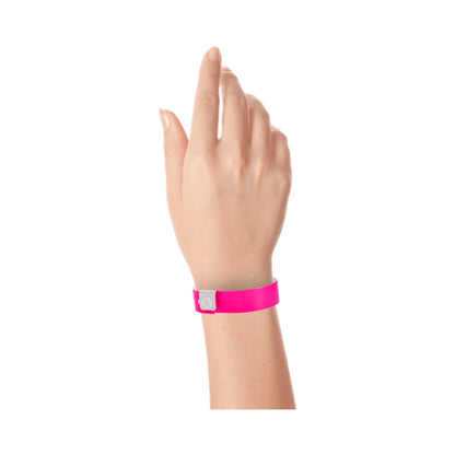 vinyl regular wristband in neon pink - shown on wrist