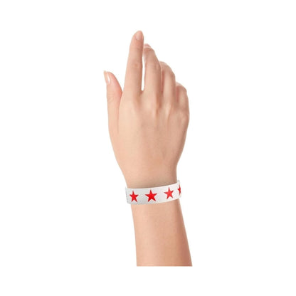 White Wristband with red stars across the band - shown in flat 