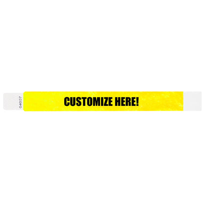 Tyvek 1" qwik fit wristband in neon yellow with black text "CUSTOMIZE HERE!" - shown in flat 