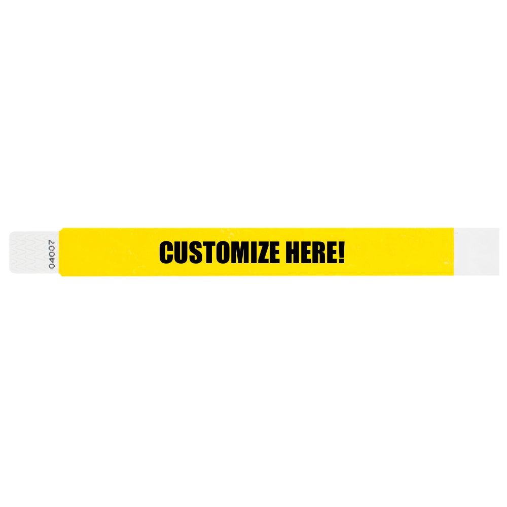 Tyvek 1" qwik fit wristband in pantone yellow with black text "CUSTOMIZE HERE!" - shown in flat 