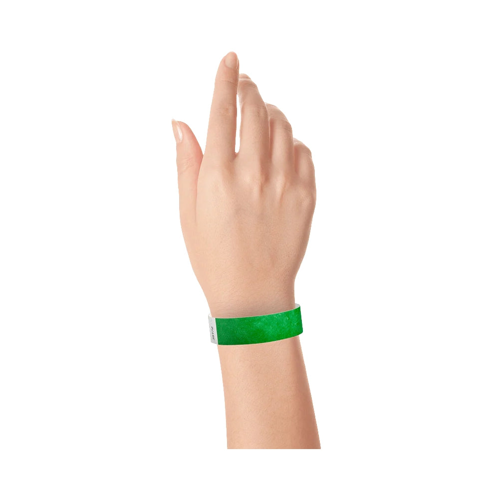 Kelly green tyvek wristband on wrist 