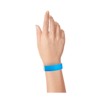 Neon blue tyvek wristband on wrist 