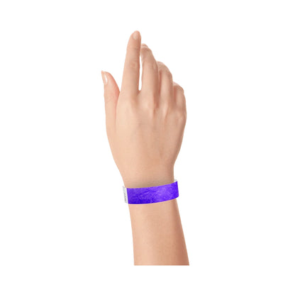 Purple tyvek wristband on wrist 