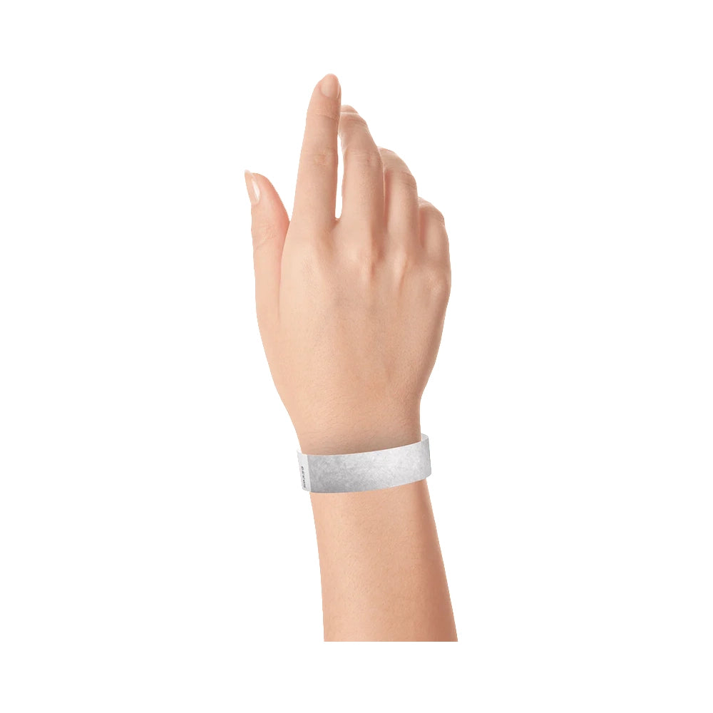 Silver tyvek wristband on wrist 