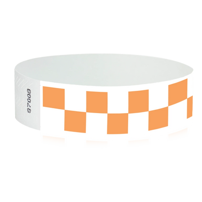 White tyvek wristband with neon orange checkerboard pattern - round version shown