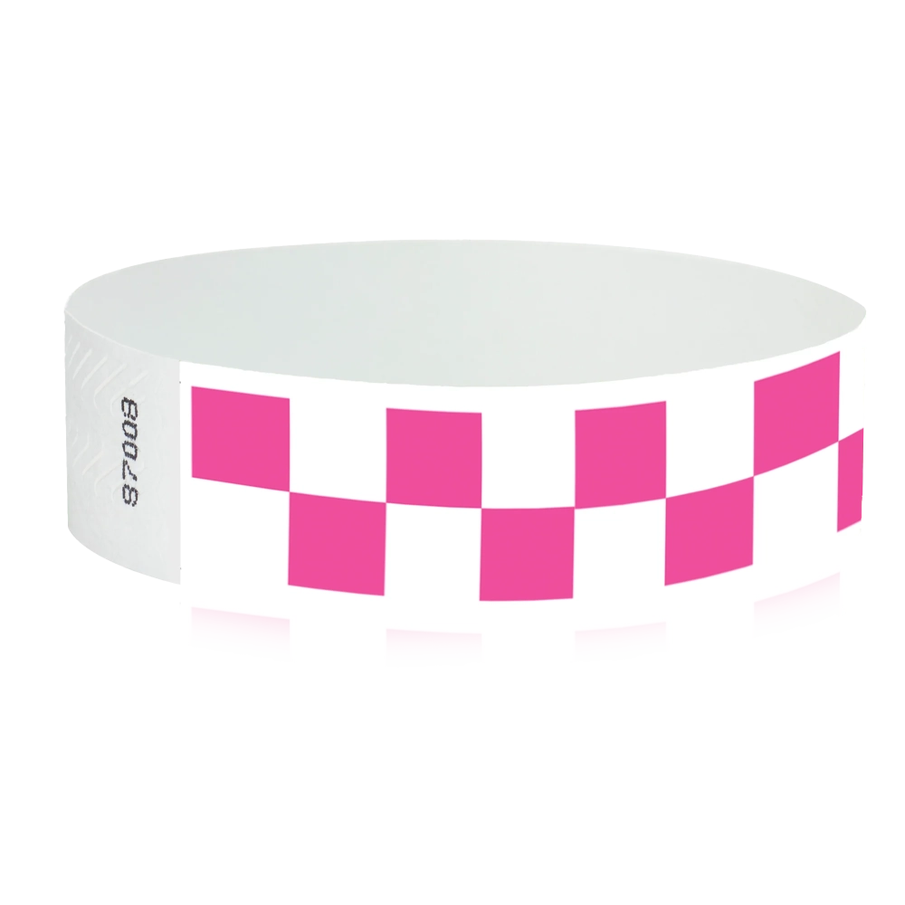 White tyvek wristband with neon pink checkerboard pattern - round version shown