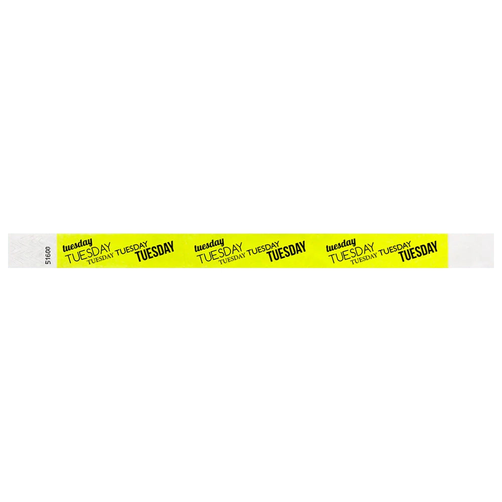 neon yellow tyvek wristband with tuesday text in black ink - flat version shown