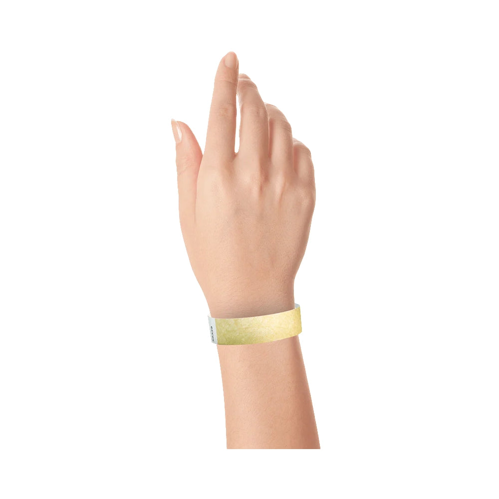 Wrist wearing tyvek 3/4" wristband in gold