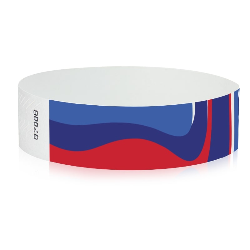 abstract pattern in neon blue, marine blue, neon red and white on a tyvek wristband - round version shown