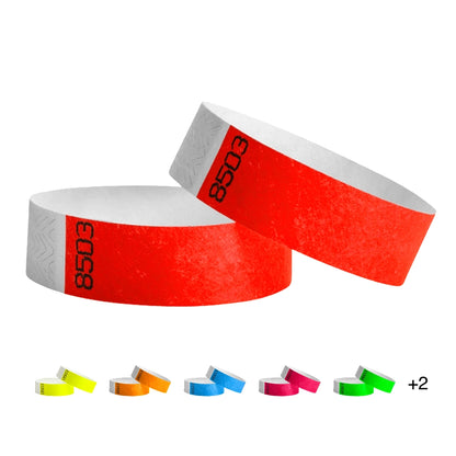 Tyvek duplicate Numbers cover - round version in red and five other colors under in neon yellow, neon orange, neon blue, neon pink and neon green. 