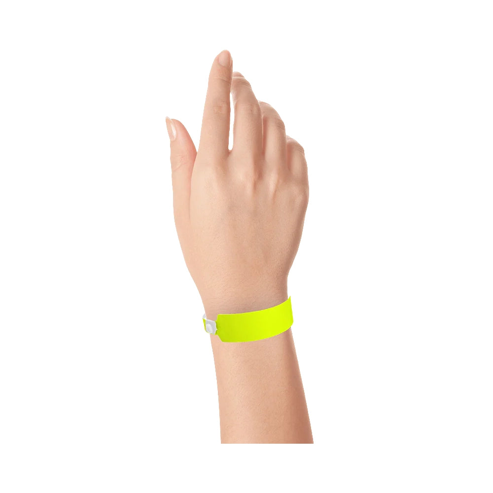 vinyl wide face wristband in neon yellow - shown on wrist 