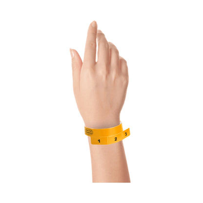 vinyl wristband with 3 tab in neon orange - shown on wrist 