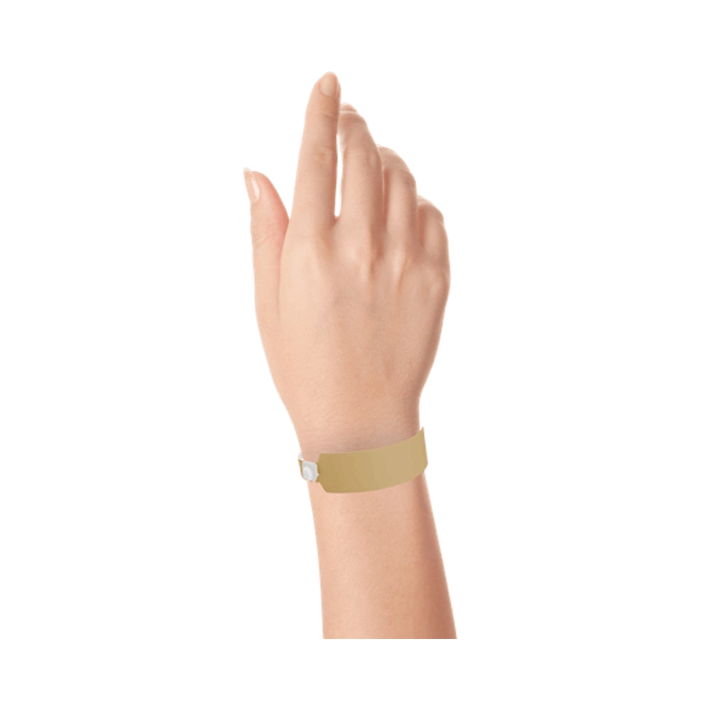 vinyl wide face wristband in gold - shown on wrist 