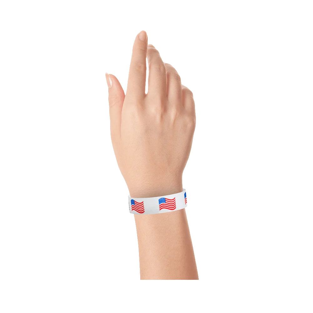 wrist wearing White wristband with wavy american flags repeated over the band