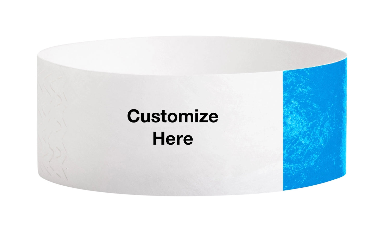 custom 1" tyvek half flood wristbands shown with a placeholder for customization in neon blue