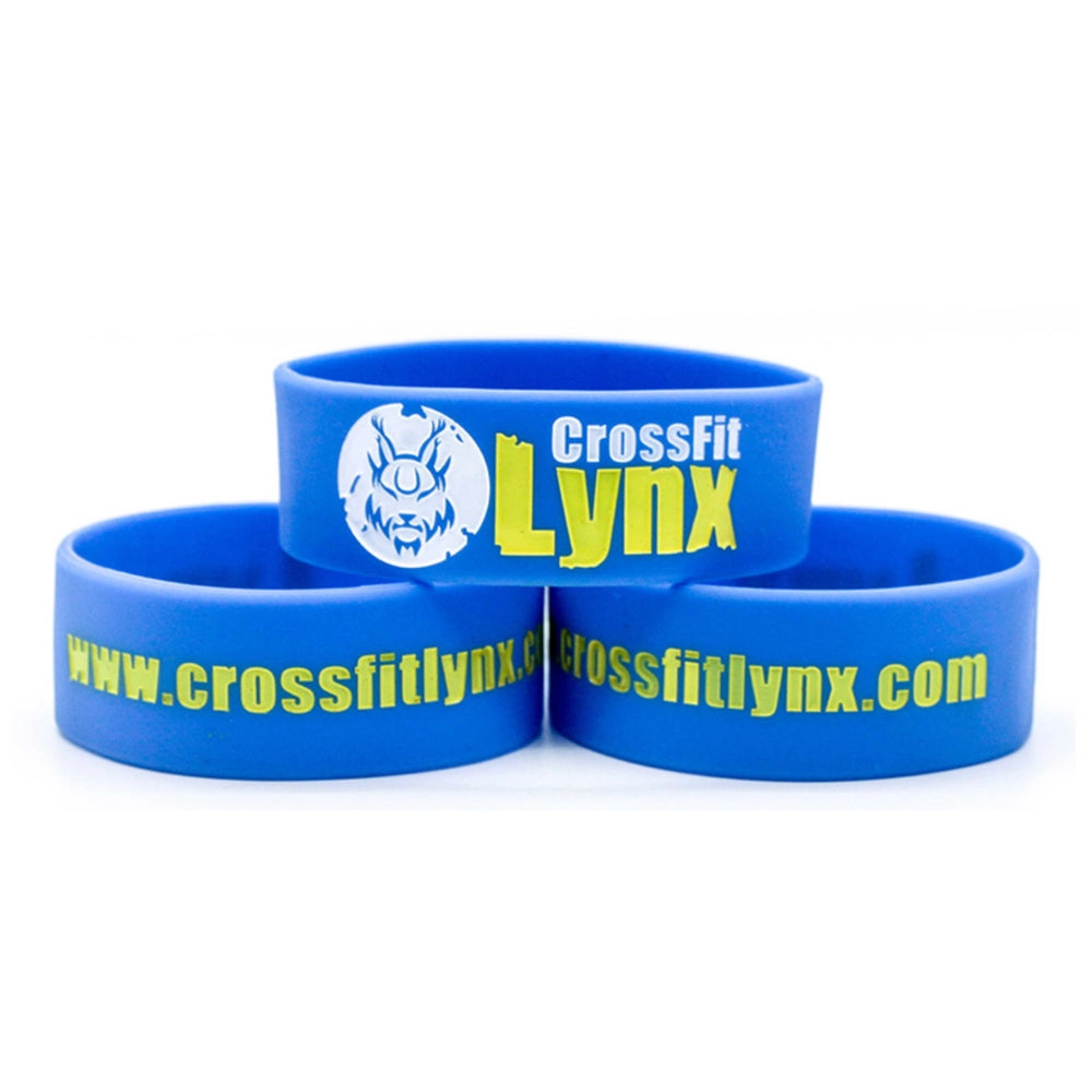 blue silicone wristband - wider width with a custom message printed in yellow and white
