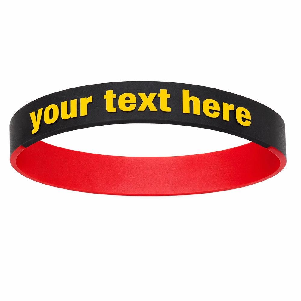 red and black segmented silicone wristband with a placeholder in yellow ink for customization
