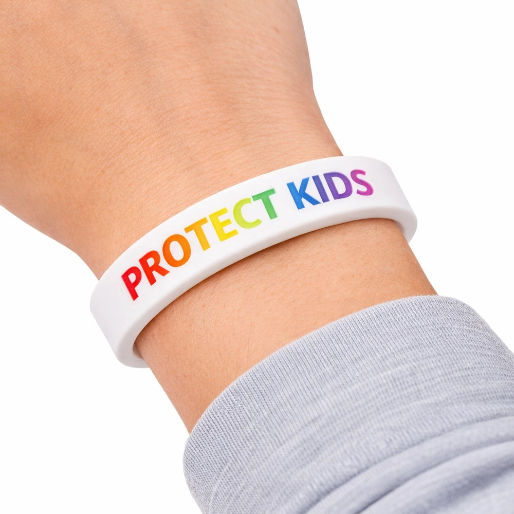 white silicone wristband with color filled message on wrist
