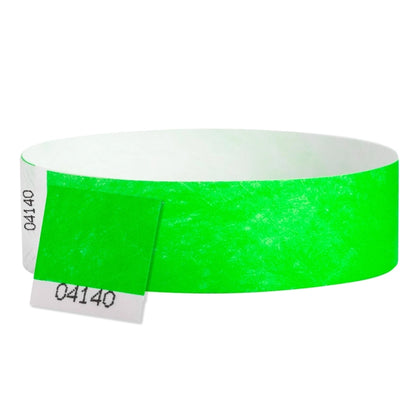 Tyvek detacheble stub wristband in neon green - shown in round 
