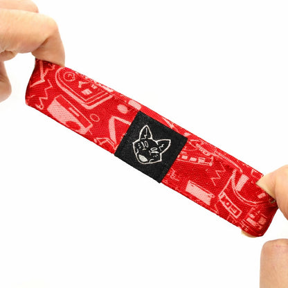 red elastic fabric wristband showing stretch