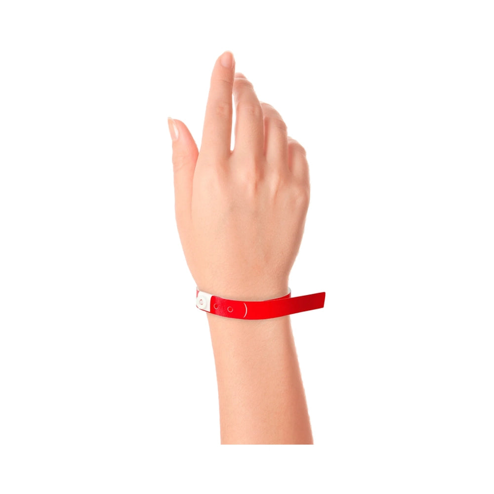 Wrist wearing plastic slim wristband in neon red
