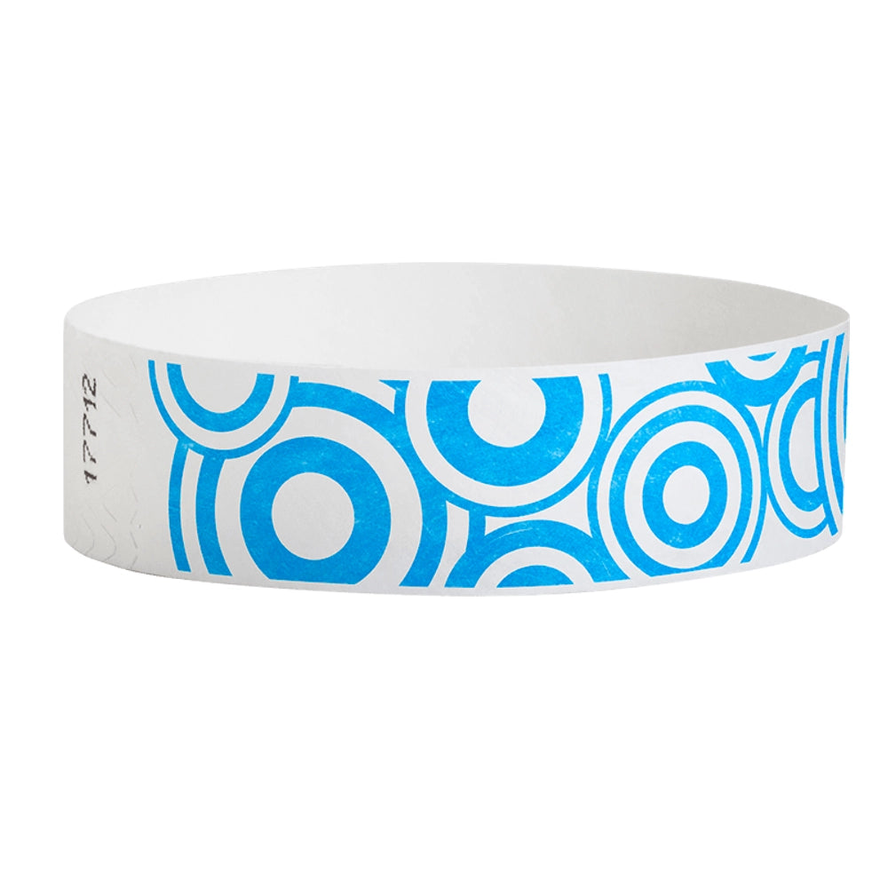 neon blue disk pattern on a white tyvek wristband - round version shown