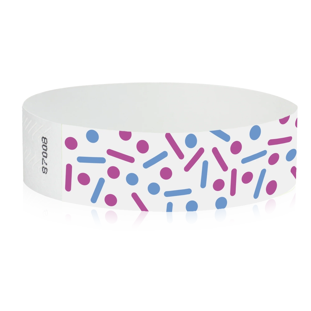 white tyvek wristband with neon pink and neon blue dots and lines - sprinkles - round version shown