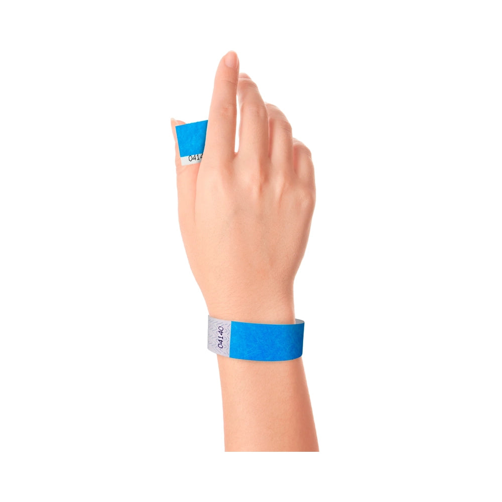 Wrist wearing Tyvek 1" stub wristband in neon blue