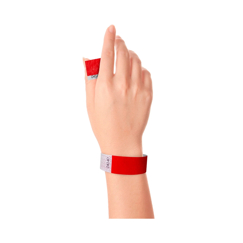 Wrist wearing Tyvek 1" stub wristband in neon red