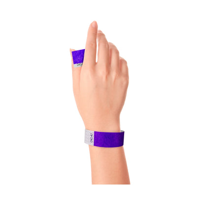 Wrist wearing Tyvek 1" stub wristband in purple